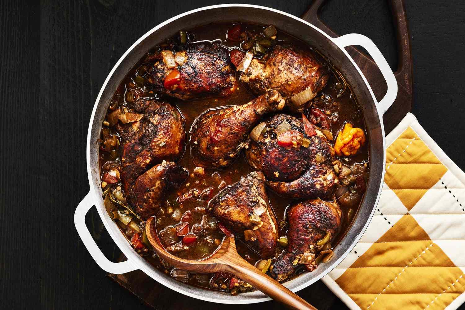 Brown stew chicken in a Dutch pot